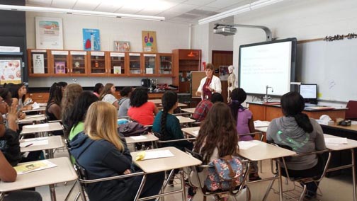 Ms. Boslego spends some time with incoming 9th graders during orientation.  Classes were in full swing this week for all students.