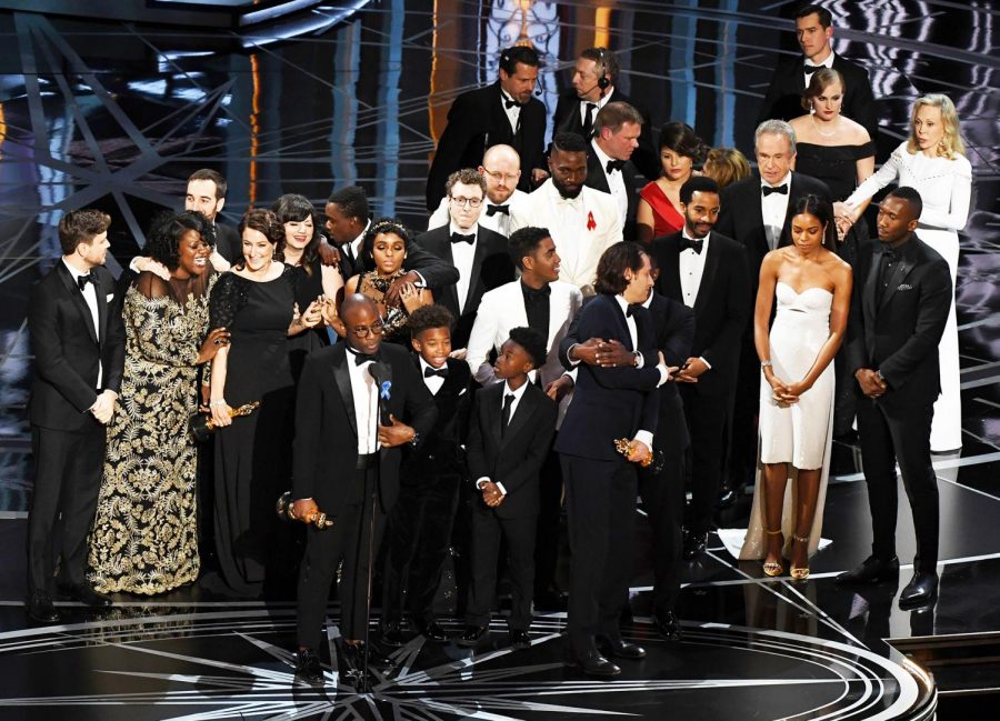 The Moonlight cast and crew accepting the award for Best Picture at the 89th Academy Awards