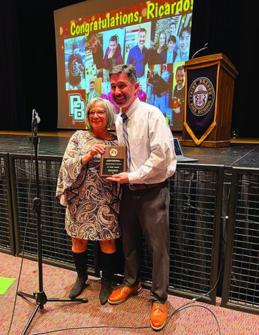 Mr. Hernandez, pictured with Executive Director of MASSP, Addie Kaufman, has been an administrator at PB for eight years.