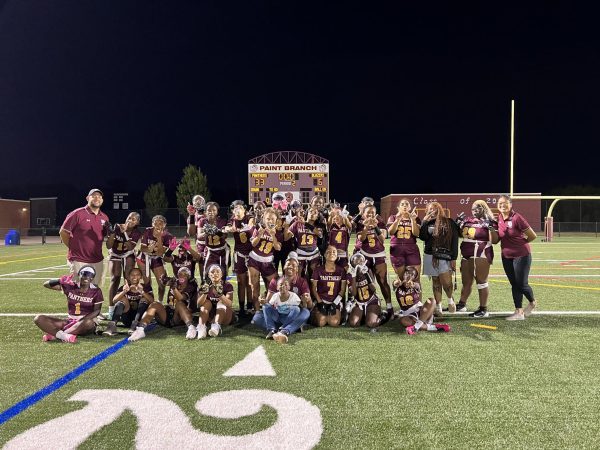 The Lady Panthers gather following their first win in program history against the Montgomery Blair Blazers.