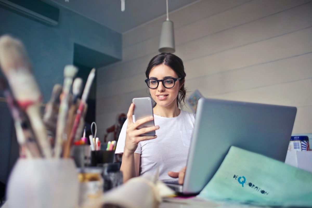 Girl looking at phone while sitting in front of her school computer, neglecting her homework

Photo by Bruce Mars on Unsplash