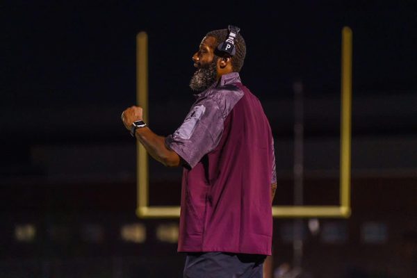 Coach Blackwell coaching the Panthers on Paint Branch's sideline.