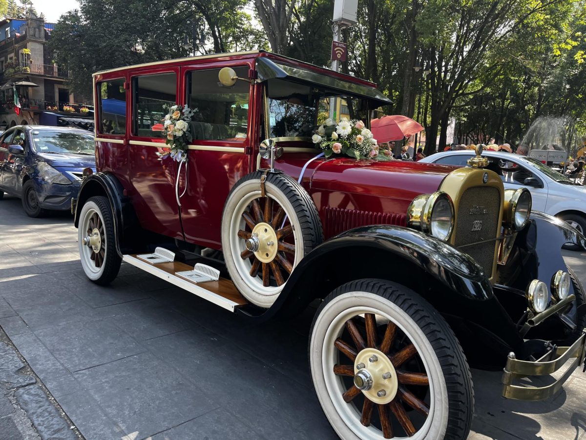 A vintage 1926 Chevrolet in Mexico waiting for a newly wedded couple.