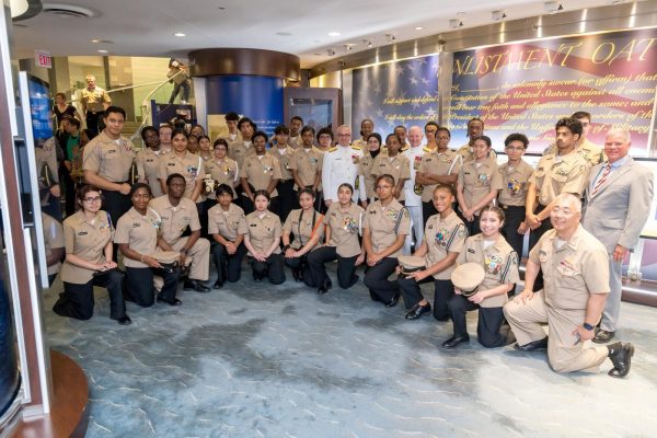 NJROTC cadets, Captain Shin, and Chief Mark pose along with Rear Admiral David J. Faehnle and Vice Admiral John Nowel, Jr.